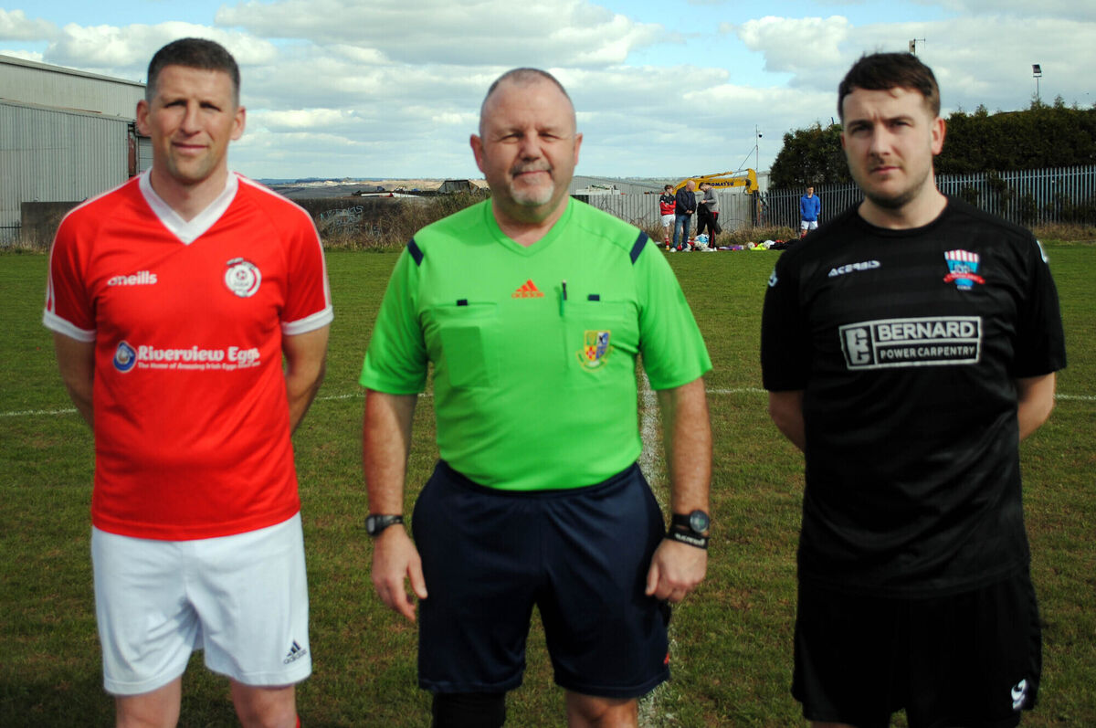 Castleview's captain Danny O'Donoghue (right) with Watergrasshill United's Paddy O'Regan, accompanied by referee Paul O'Sullivan. Castleview's captain Danny O'Donoghue (right) with Watergrasshill United's Paddy O'Regan, accompanied by referee Paul O'Sullivan.