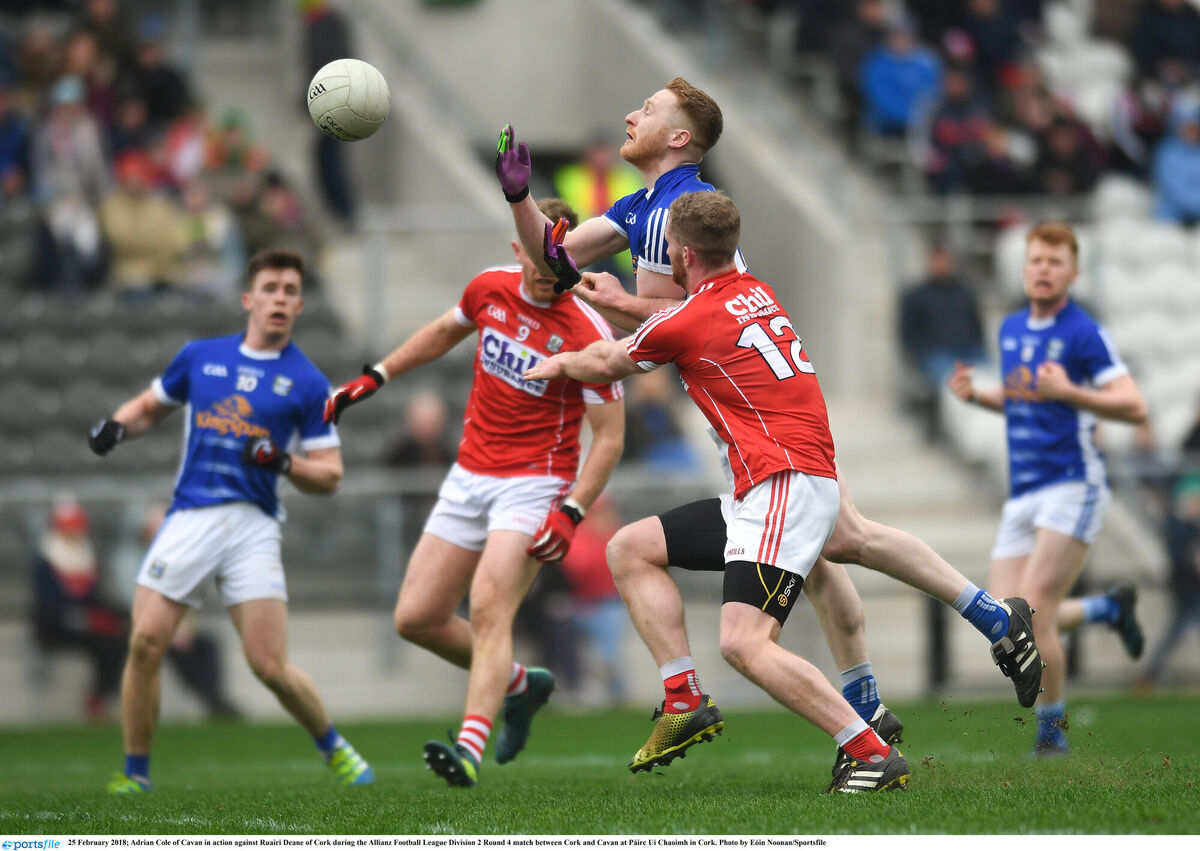 Adrian Cole of Cavan in action against Ruairí Deane of Cork in 2018. Picture: Eóin Noonan/Sportsfile Adrian Cole of Cavan in action against Ruairí Deane of Cork in 2018. Picture: Eóin Noonan/Sportsfile