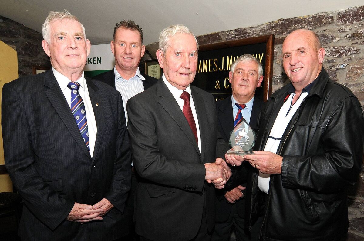 Former Manchester United and Leicester City manager Frank O'Farrell making the presentation to Eoin Dunlea representing Len Davis of Evergreen United, at the presentation to members of the Evergreen United 1949 team at the Heineken Ireland Brewery, also included are FAI vice-president Tony Fitzgerald, Jim Cashman; Heineken Ireland and Ted O'Mahony; Chairman of Cork AUL. Picture: David Keane. Former Manchester United and Leicester City manager Frank O'Farrell making the presentation to Eoin Dunlea representing Len Davis of Evergreen United, at the presentation to members of the Evergreen United 1949 team at the Heineken Ireland Brewery, also included are FAI vice-president Tony Fitzgerald, Jim Cashman; Heineken Ireland and Ted O'Mahony; Chairman of Cork AUL. Picture: David Keane.