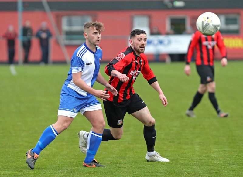 Roy Kenny, Ringmahon Rangers, battles Craig Donnellan, College Corinthians, in 2020 in the FAI Intermediate Cup. Picture: Jim Coughlan Roy Kenny, Ringmahon Rangers, battles Craig Donnellan, College Corinthians, in 2020 in the FAI Intermediate Cup. Picture: Jim Coughlan
