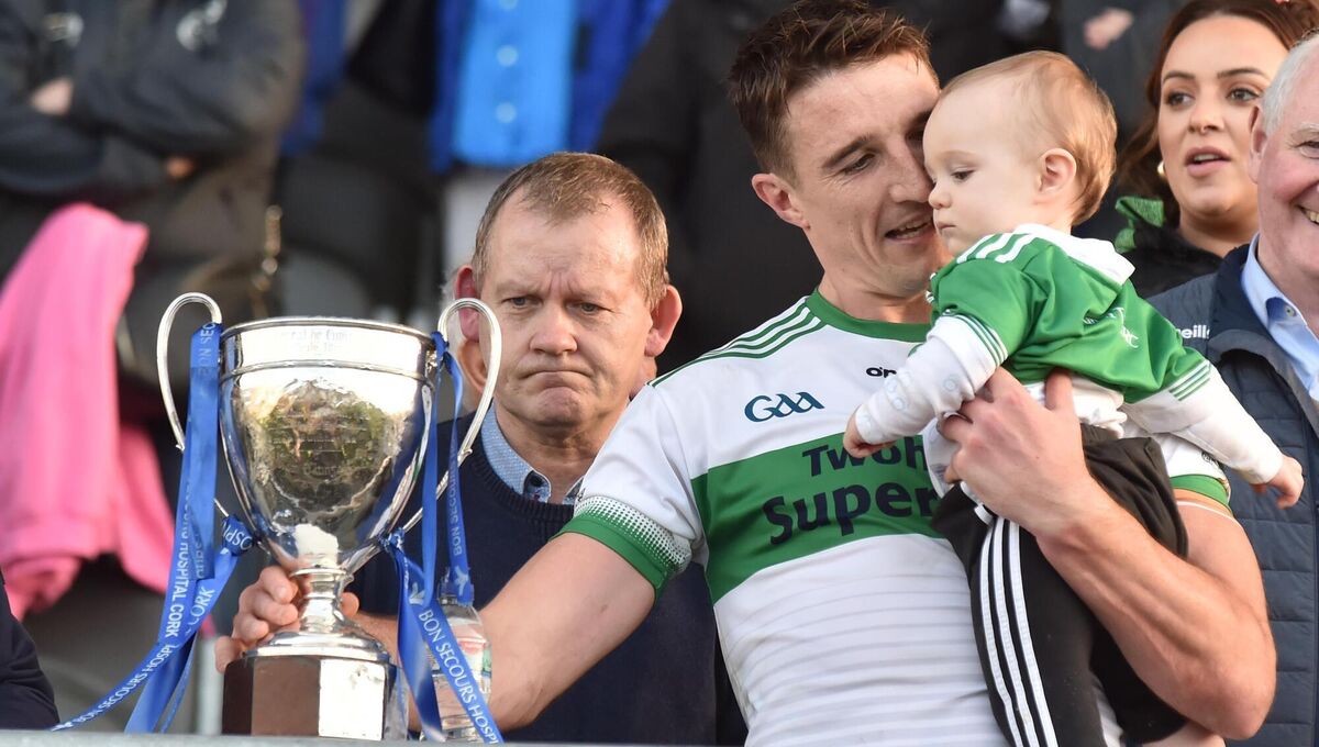 Kanturk captain Aidan Walsh with his son, Macdara, after his side won the Cork PIFC title in 2022. Picture: Eddie O'Hare Kanturk captain Aidan Walsh with his son, Macdara, after his side won the Cork PIFC title in 2022. Picture: Eddie O'Hare