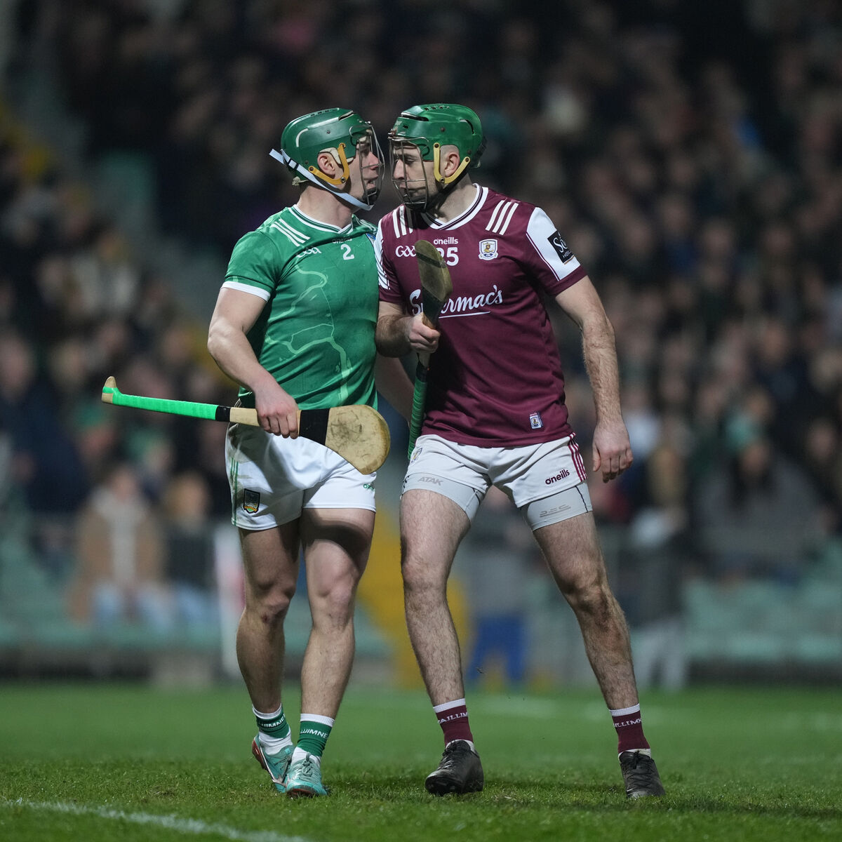 Sean Finn of Limerick and Brian Concannon of Galway clash during their Allianz Hurling League game. Picture: ©INPHO/James Lawlor