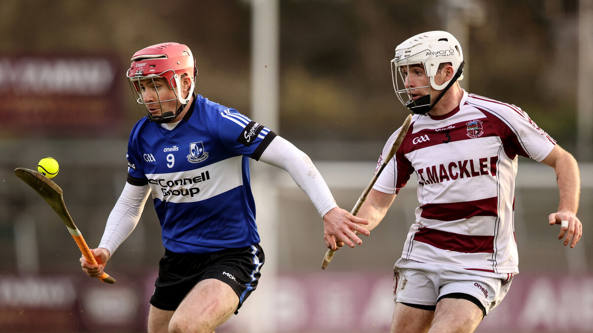Sarsfields' Daniel Kearney tries to get away from Paul McNeill of Slaughtneil in December's AIB All-Ireland Club SHC semi-final. Picture: Inpho/Ben Brady