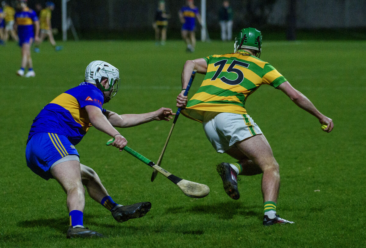  Peter Linehan, Blackrock, has his jersey pulled by Harry Andrews, Carrigaline. Picture: Dan Linehan
