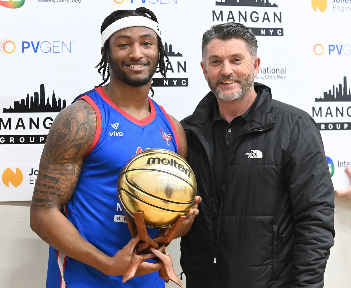 Jim Garvin, PVGen, presents the Men's Super League Player of the Month for February to UCC Demons' Patrick Robinson. Picture: Eddie O'Hare