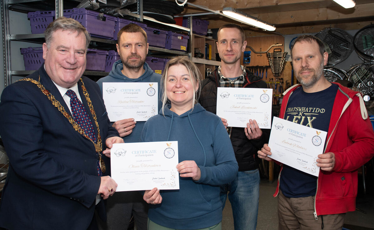 Lord Mayor Cllr Dan Boyle pictured presenting Certificates of Participation of Advanced Bike Maintenance to Ruslan Folstenkov, Olena Folstenkova, Jakub Lisakowski and Ludwick Wlodorz zduring his recent visit to the Cork Deaf Enterprise in Ballinlough. Picture: Howard Crowdy
