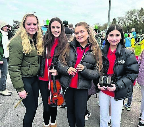 Siun Morrissey, Aoife Ni Nuanain, Michaela Flynn Farrell, and Lucy McKibben from Comhaltas na Dúglaise at the Douglas St Patrick’s Day parade.