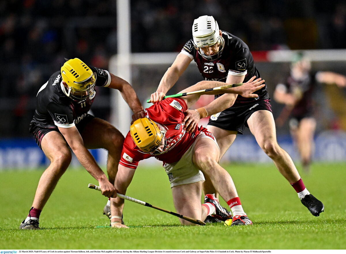 Niall O'Leary of Cork in action against Tiernan Killeen and Declan McLaughlin of Galway. Picture: Piaras Ó Mídheach/Sportsfile