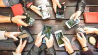 People group having addicted fun together using smartphones - Detail of hands sharing content on social network with mobile smar