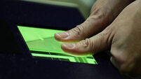 Home Office Minister Demonstrates The New Biometric Enrolment Facility