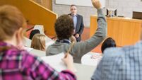 Students and teacher at the lecture hall