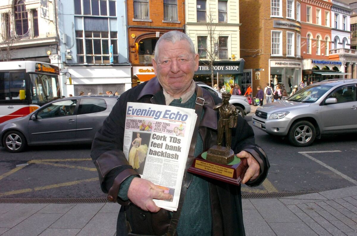 Among the stories featured in the book is one entitled ‘Evening Echo Boys’. The cover of the book is a portrait of the legendary street newspaper vendor, the late Michael O’Regan. Michael is pictured here marking his 50th year selling papers in Patrick Street. Picture: Richard Mills