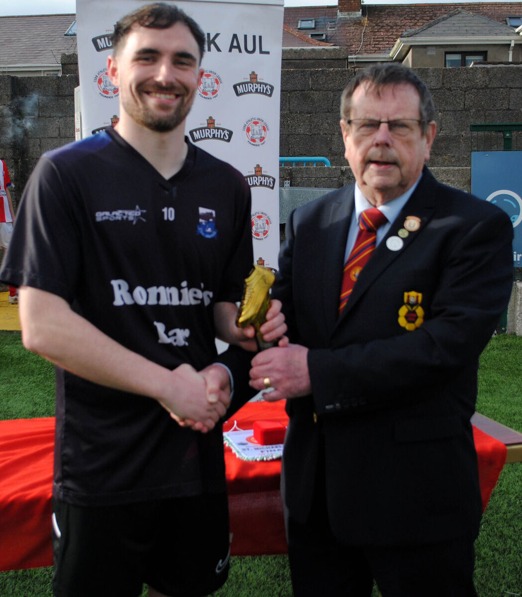 CFC Banteer's Tadgh Sexton is presented with the Man of the Match award, sponsored by Gary McCarthy Trophies, by Tom Fitzgerald. Picture: