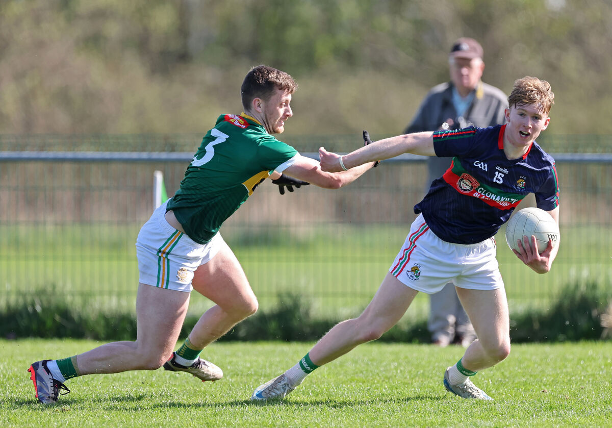  Alan O'Callaghan of St Michael's tries to challenge Luke Griffin of Clonakilty. Picture: Jim Coughlan