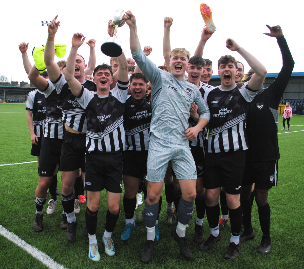 Rathcormac players celebrate after winning the Saxone Cup following a 3-1 victory over Boher Celtic at St. Colman's Park.