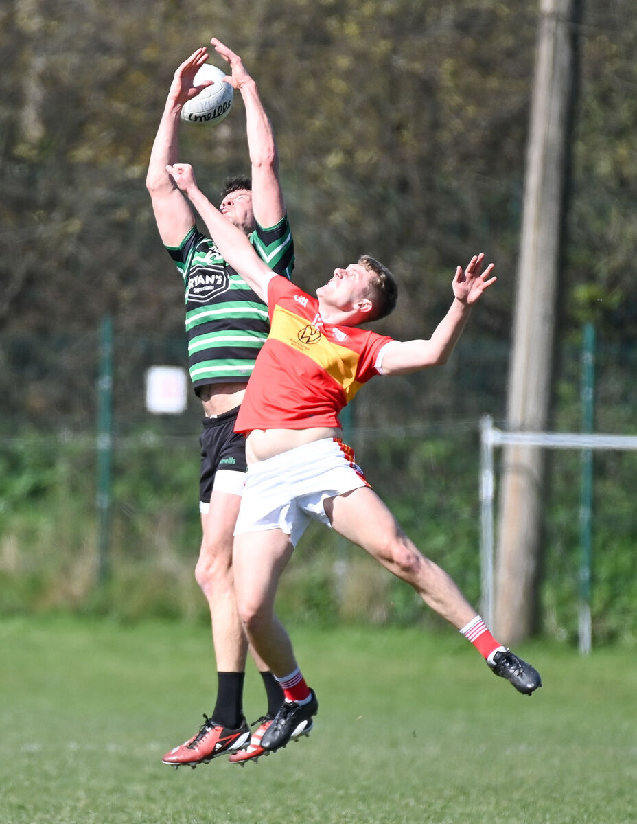 Douglas' Padraig Lucey and Eire Og's Jack Murphy, compete in the air during their Senior Football League clash at Douglas. Picture: David Keane. Douglas' Padraig Lucey and Eire Og's Jack Murphy, compete in the air during their Senior Football League clash at Douglas. Picture: David Keane.