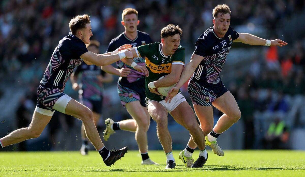 Mayo’s Donnacha McHugh and Eoghan McLaughlin tackle David Clifford of Kerry. Picture: INPHO/James Crombie