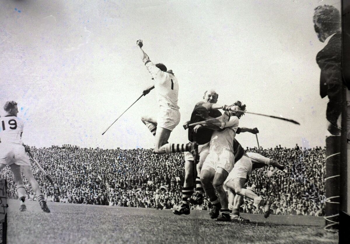 Des Barry's favourite sports picture - Ned Power, the Waterford goalkeeper, catching the ball against Cork in 1963 before Christy Ring could meet it. Picture: Louis MacMonagle