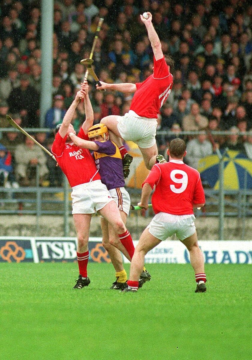 Teddy McCarthy rising majestically to catch the ball in the 1993 NHL final replay against Wexford, as captured by Des Barry