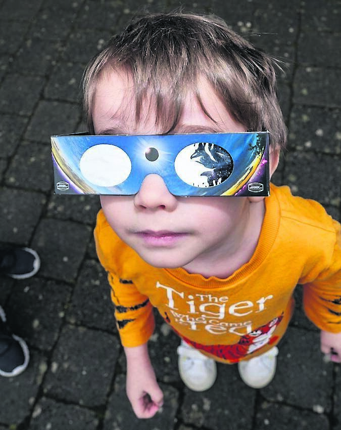 No sunshine, no problem — Sonny Keys, joins fellow eclipse watchers at Blackrock Castle Observatory, soaking in the experience, clouds and all.	Picture: Chani Anderson
                    
