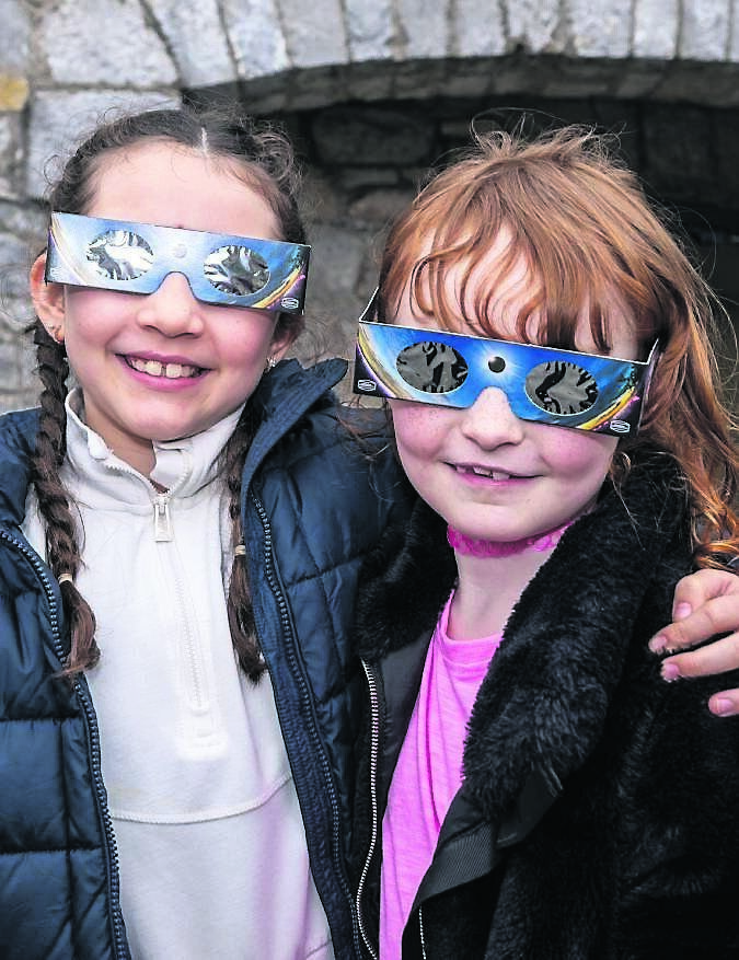 Saoirse Jordan and Gabriella Coughlan were ready with their eclipse glasses at Blackrock Castle Observatory for a special celestial event.	Picture: Chani Anderson
                    
