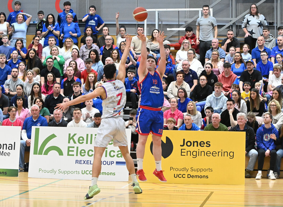 UCC Demons' David Lehane shoots a basket from Energywise Ireland Neptune's Jaksa Sola. Picture: Eddie O'Hare