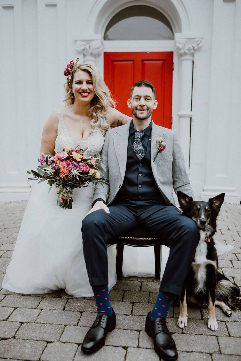 The couple’s dog was a ring-bearer at the ceremony. The couple’s dog was a ring-bearer at the ceremony.