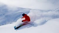 Skiing fresh powder on a ski vacation