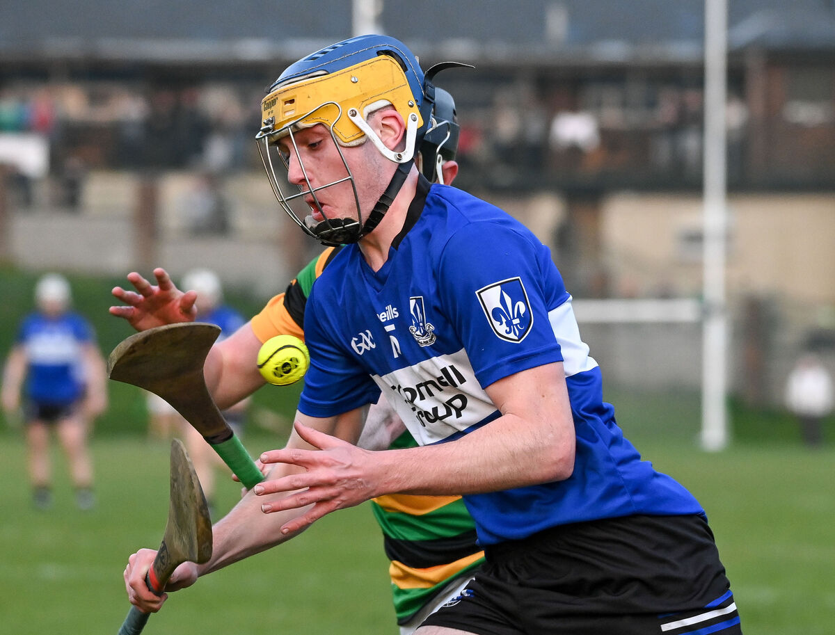  Sarsfields' Cillian McCarthy tries to get past Glen Rovers' Eoin Varian. Picture: David Keane.