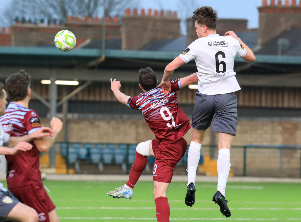 Wexford's Dean Larkin heads the ball clear from Cobh's Cian Murphy. Picture: David Creedon Wexford's Dean Larkin heads the ball clear from Cobh's Cian Murphy. Picture: David Creedon
