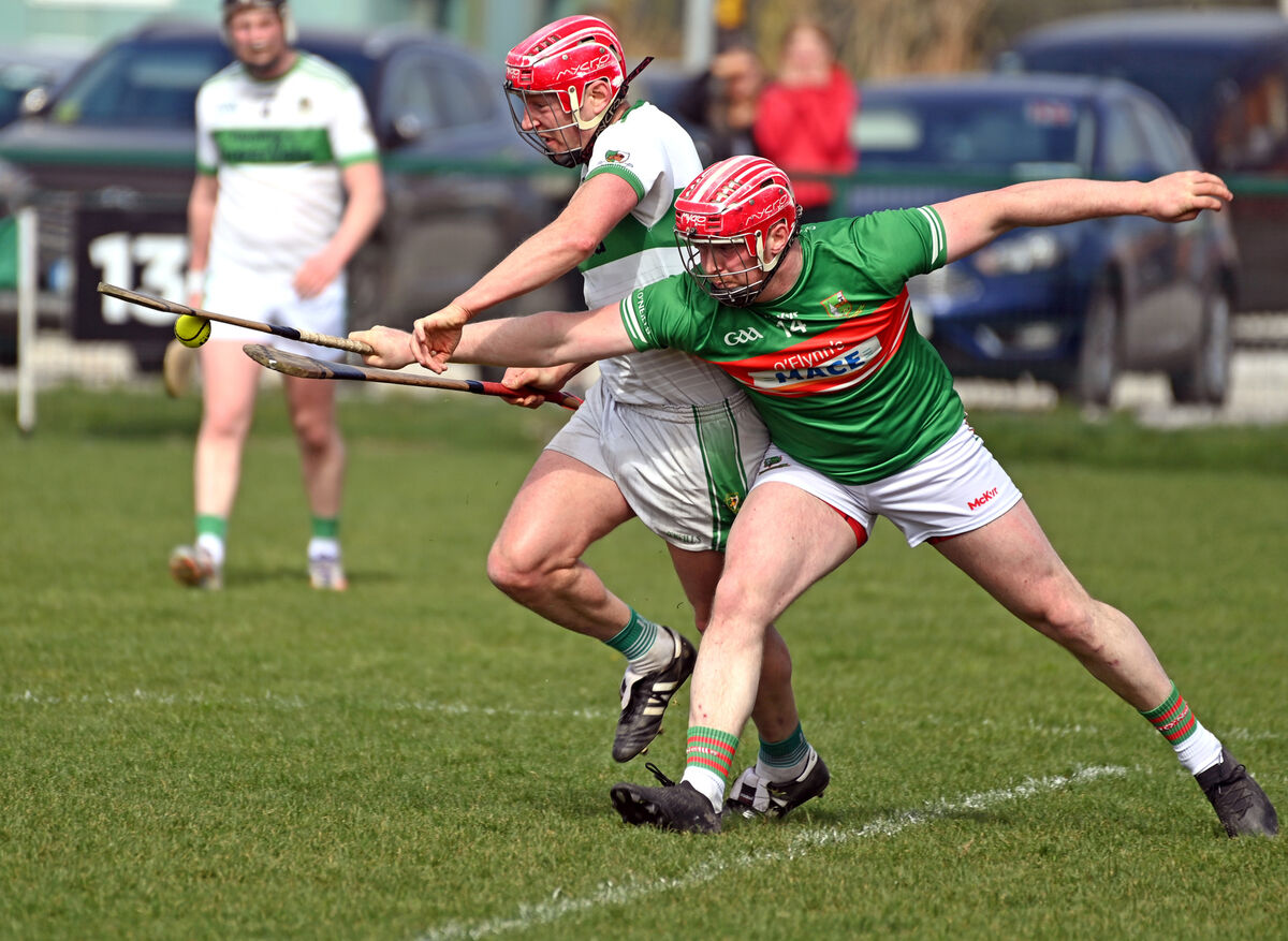 Kanturk's Sean Moylan is tackled by Fr O'Neills' Billy Dunne. Picture: Eddie O'Hare
