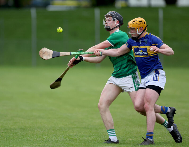  Cian O'Driscol of Ballincollig (left) scored a goal as they beat Éire Óg. Picture: Jim Coughlan