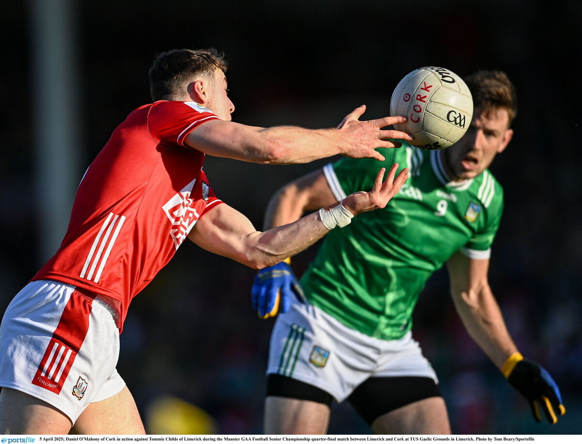 Daniel O'Mahony of Cork in action against Tommie Childs of Limerick. Picture: Tom Beary/Sportsfile