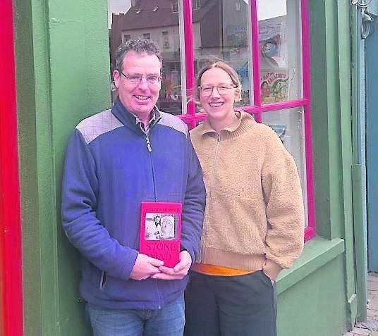 Richard Forrest of Mayfield Library and Dee Collins of Mercier Press with a copy of ‘Stone Mad’ by Seamus Murphy.	Picture: Ronan Leonard
                    