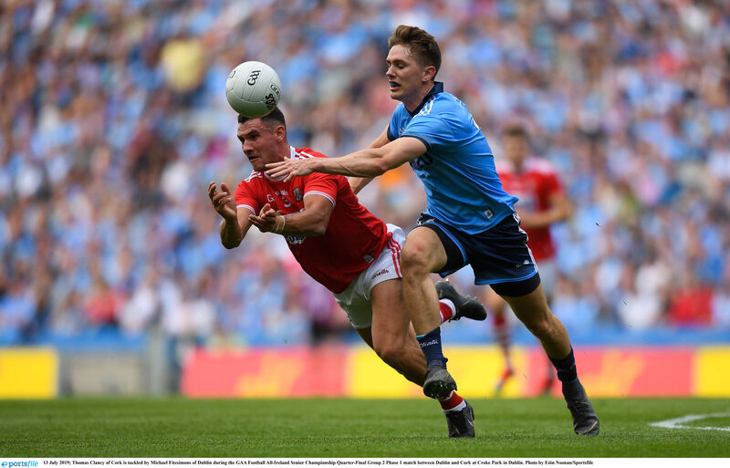 Thomas Clancy of Cork is tackled by Michael Fitzsimmons of Dublin in 2019. Picture: Eóin Noonan/Sportsfile