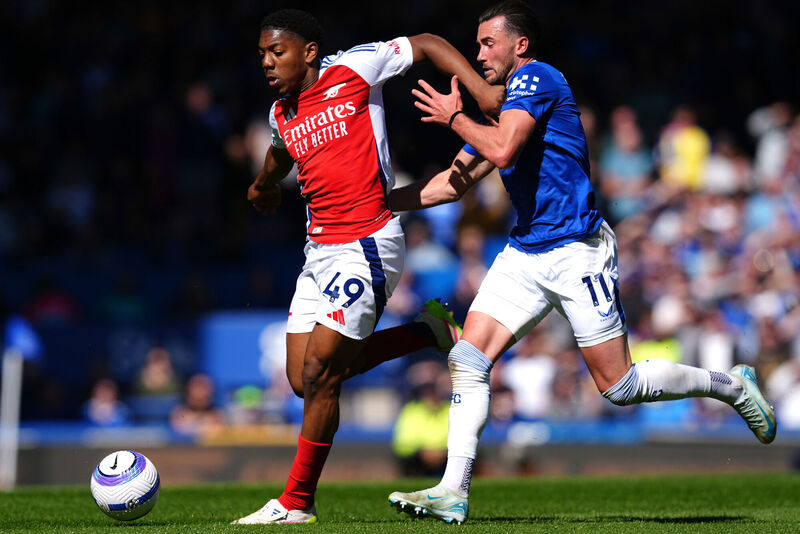 Arsenal's Myles Lewis-Skelly (left) and Everton's Jack Harrison battle for the ball  leading to a penalty for Everton during their Premier League match at Goodison Park, Liverpool. Picture: Martin Rickett/PA Wire.