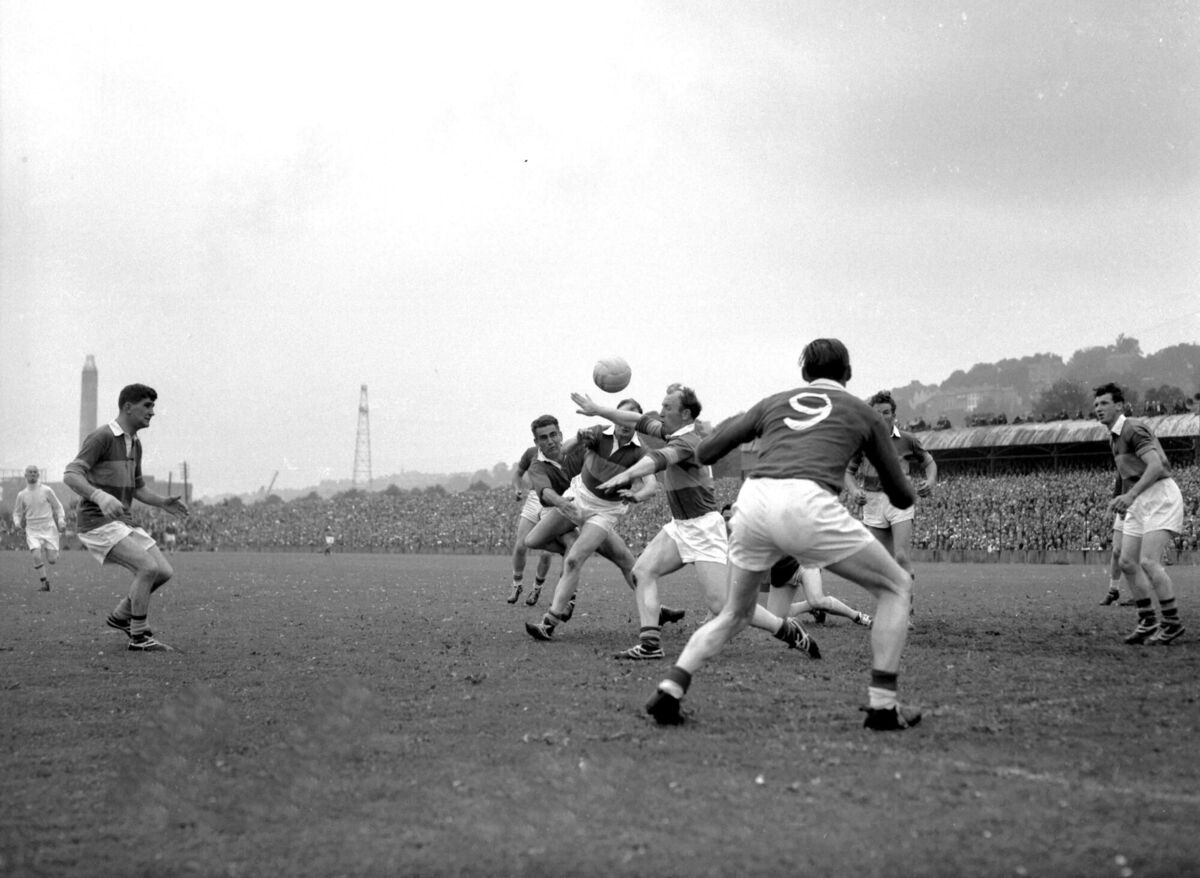 Mick O'Dwyer in action in the 1965 Munster football final in Cork. Picture: Donal MacMonagle Mick O'Dwyer in action in the 1965 Munster football final in Cork. Picture: Donal MacMonagle