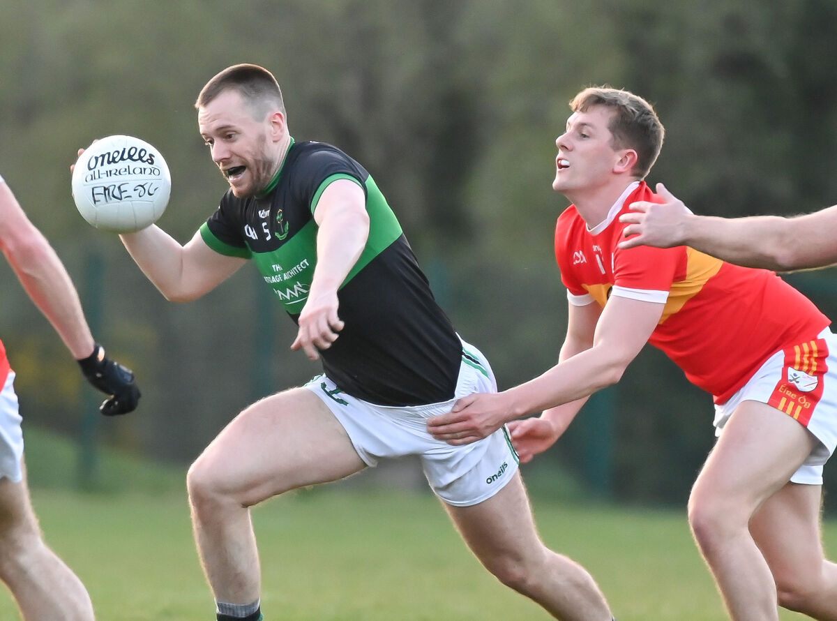 Nemo Rangers' Alan O'Donovan races past Éire Óg's Jack Murphy. Picture: David Keane Nemo Rangers' Alan O'Donovan races past Éire Óg's Jack Murphy. Picture: David Keane