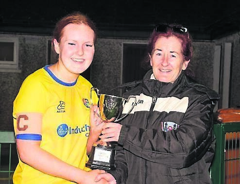 Carrigaline captain Sarah O’Connell receives the CWSSL U19 Cup from Helen Noonan of the CWSSL, following Carrigaline’s victory over Macroom in the final at St Colman’s Park, Cobh.	Picture: Howard Crowdy
                    