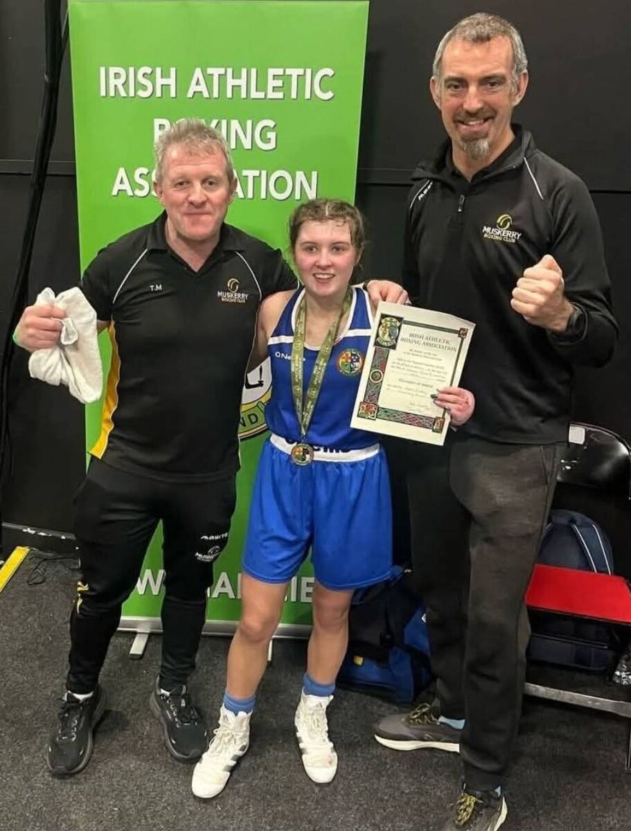 Muskerry Boxing Club celebrates another All-Ireland winner in Abby Murray, pictured with her father and coach Tom Murray and coach Mike McGrath JW Muskerry Boxing Club celebrates another All-Ireland winner in Abby Murray, pictured with her father and coach Tom Murray and coach Mike McGrath JW