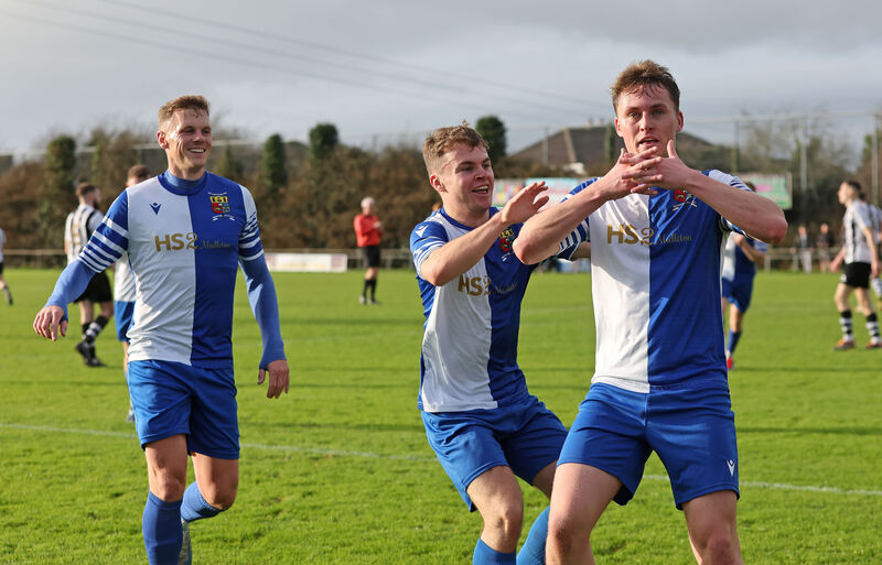 Douwe Van Sinderen, College Corinthians, celebrates his goal with Ian Turner and Keelan Crowley. Picture: Jim Coughlan. Douwe Van Sinderen, College Corinthians, celebrates his goal with Ian Turner and Keelan Crowley. Picture: Jim Coughlan.
