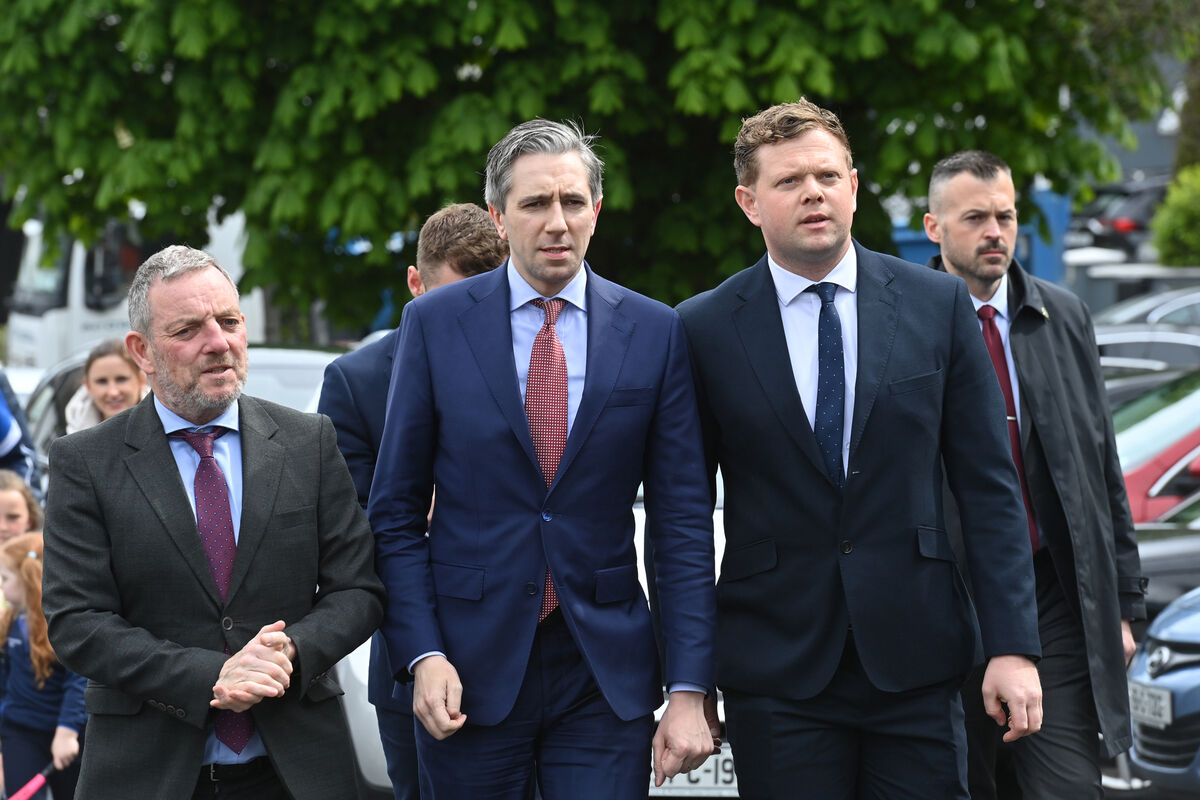  Simon Harris, Tánaiste and minister for foreign affairs with minister of state, Jerry Buttimer TD and councillor Jack White at the Church of the Holy Spirit, Dennehy’s Cross, Cork, attending the Liturgy of the Word for the late John Mullins. Picture: Dan Linehan