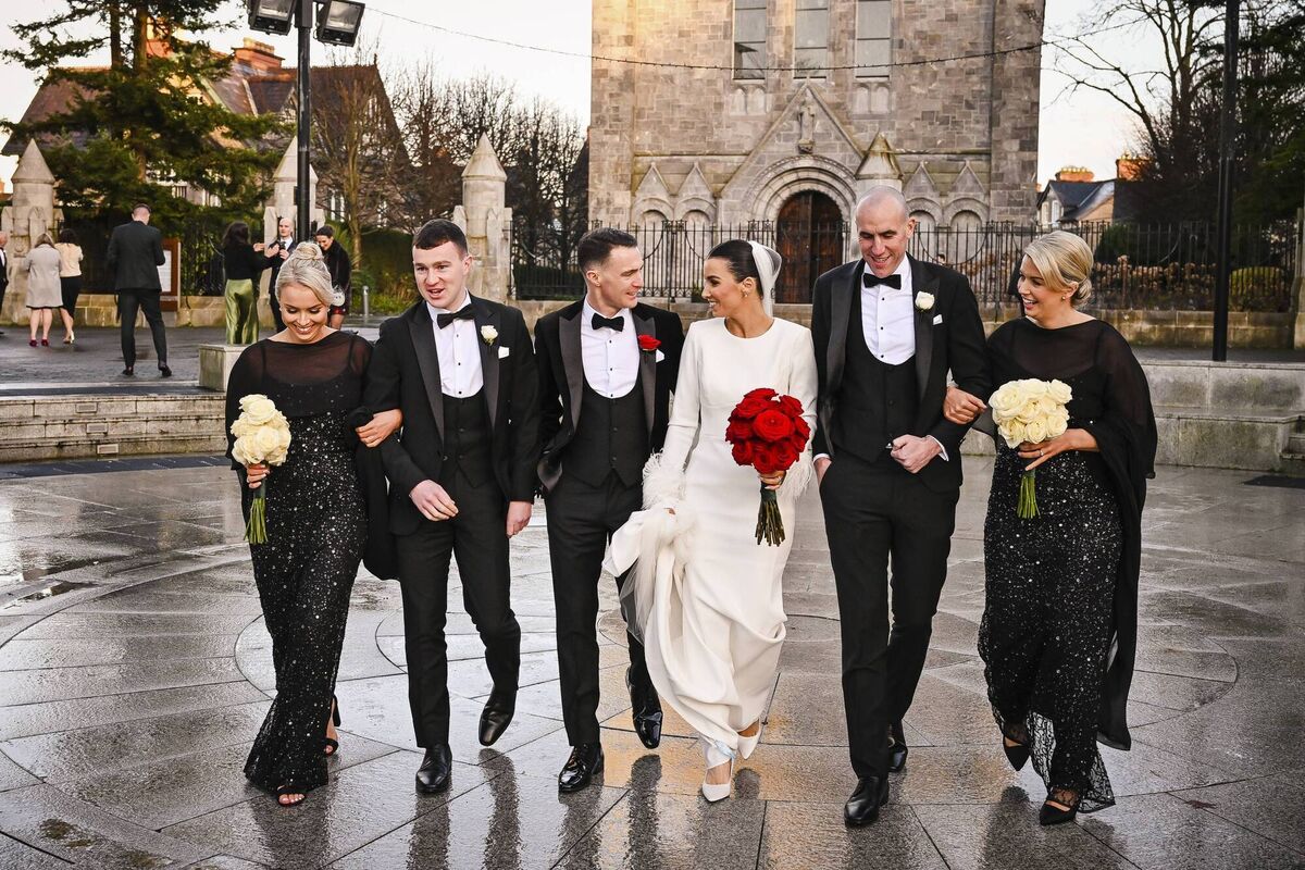 The couple’s bridal party included Karen’s sisters Michelle and Lisa, Darren’s brother John, and his cousin Darragh. The couple’s bridal party included Karen’s sisters Michelle and Lisa, Darren’s brother John, and his cousin Darragh.