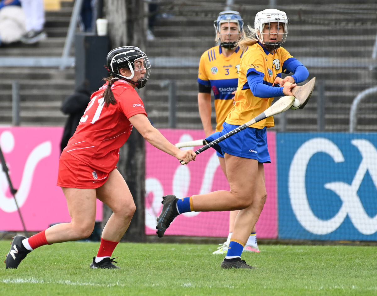Cork's Amy O'Connor blocks down Clare's goalkeeper Rachael Daly. Picture: Eddie O'Hare Cork's Amy O'Connor blocks down Clare's goalkeeper Rachael Daly. Picture: Eddie O'Hare