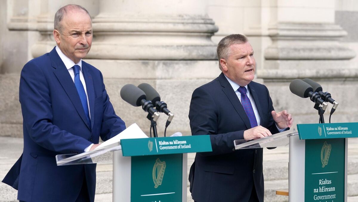 Taoiseach Micheál Martin (left) and Michael McGrath (right), EU commissioner for democracy, justice, the rule of law, and consumer protection