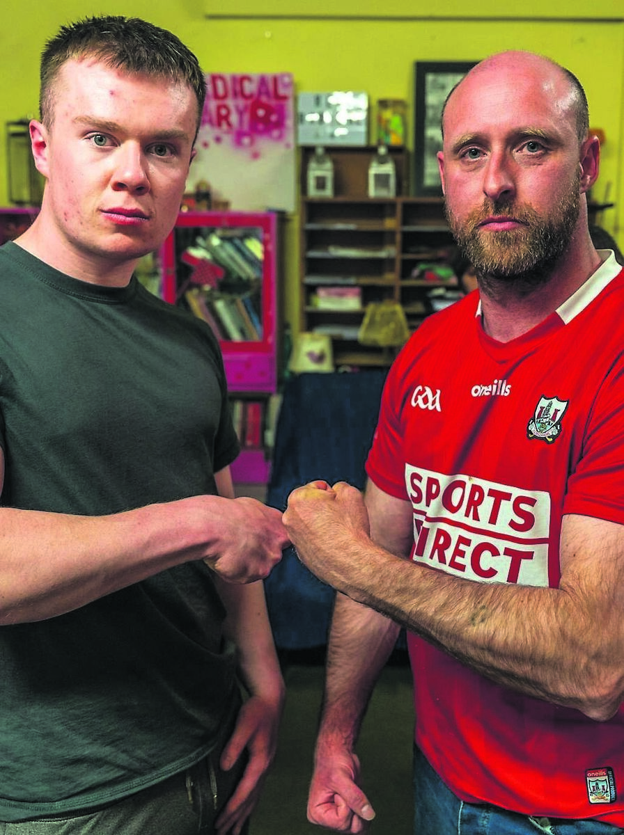 Ronnie Mostyn, founder of Street Level Arm Wrestling on Shandon Street, and Ben O’Donovan engaged in hand to hand combat at the club. Pictures: Noel Sweeney