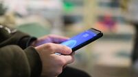 Child boy playing games on a smartphone,kids education technology,addiction