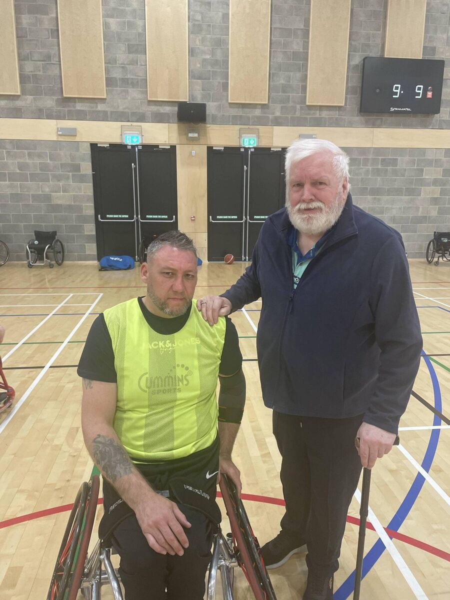 Rebel Wheeler’s veteran player Derek Hegarty with his father Kevin at a recent training session at the MTU Arena. KD Rebel Wheeler’s veteran player Derek Hegarty with his father Kevin at a recent training session at the MTU Arena. KD