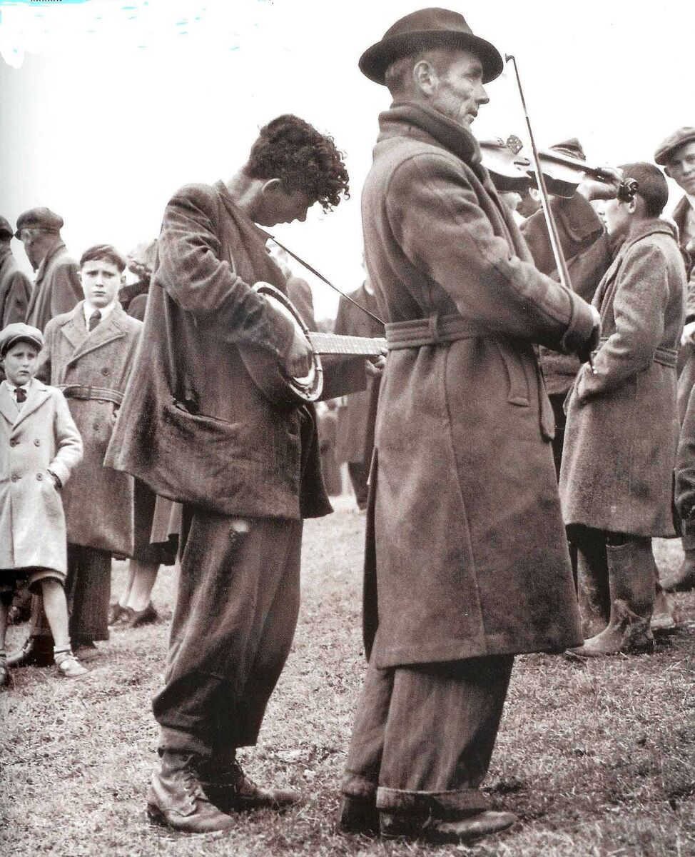 Paddy Dunne with Fred Williams (Cork) busking at a match in Clare. The Williams family operated a fun fare in the northern suburbs.