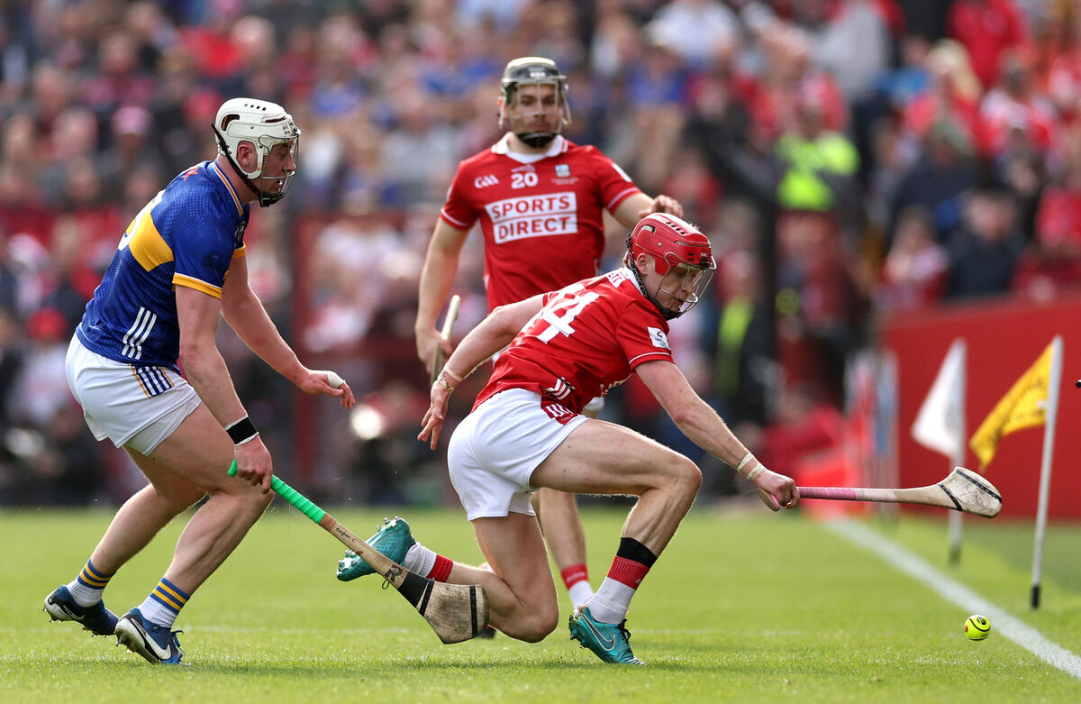 Tipperary’s Eoghan Connolly and Alan Connolly of Cork battling. Picture: INPHO/James Crombie